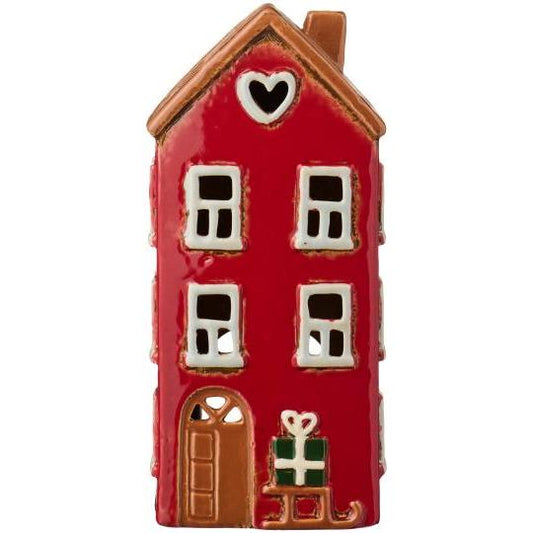 Light house with a sled by the door