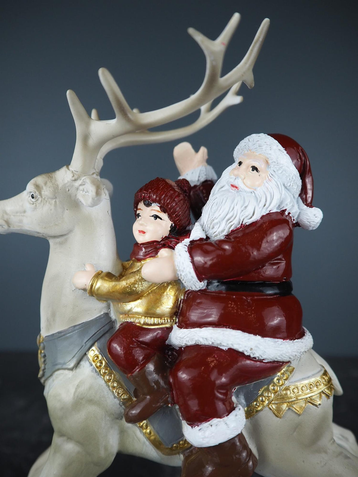 Santa Claus on reindeer 19x21 cm
